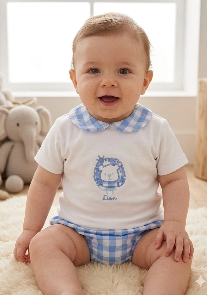 Conjunto de niño con un león en color azul.