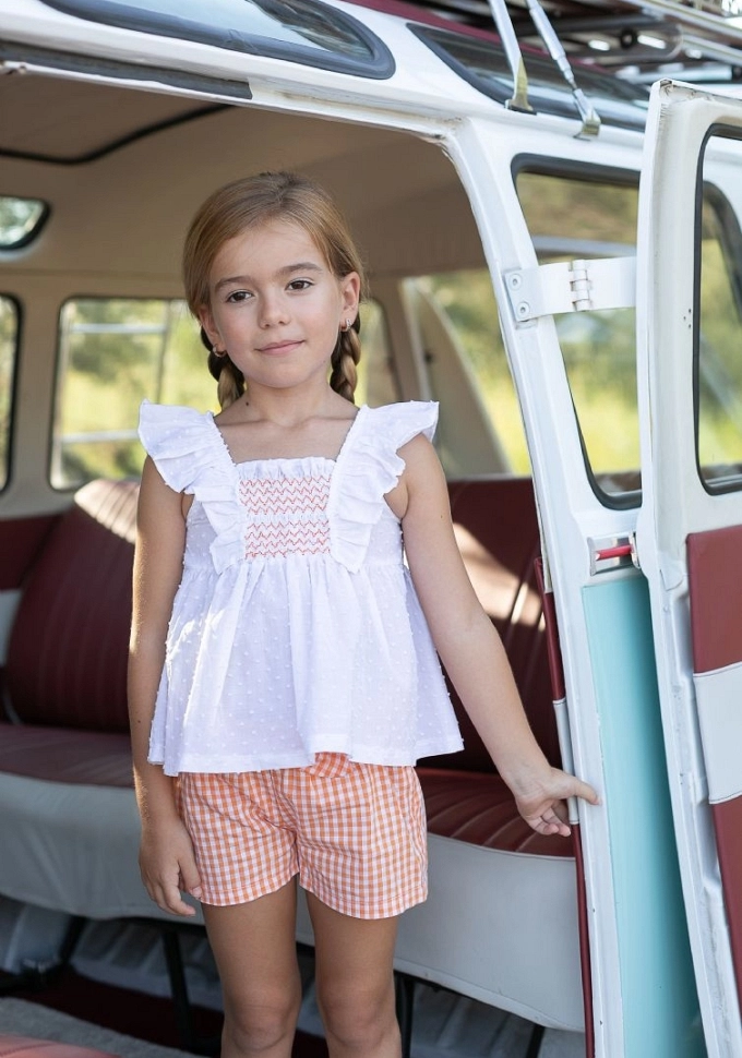 Conjunto de pantalón corto en color naranja.Coco-acqua.