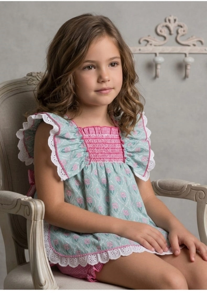 Jesusito con florecitas en color fucsia.Basmarti.