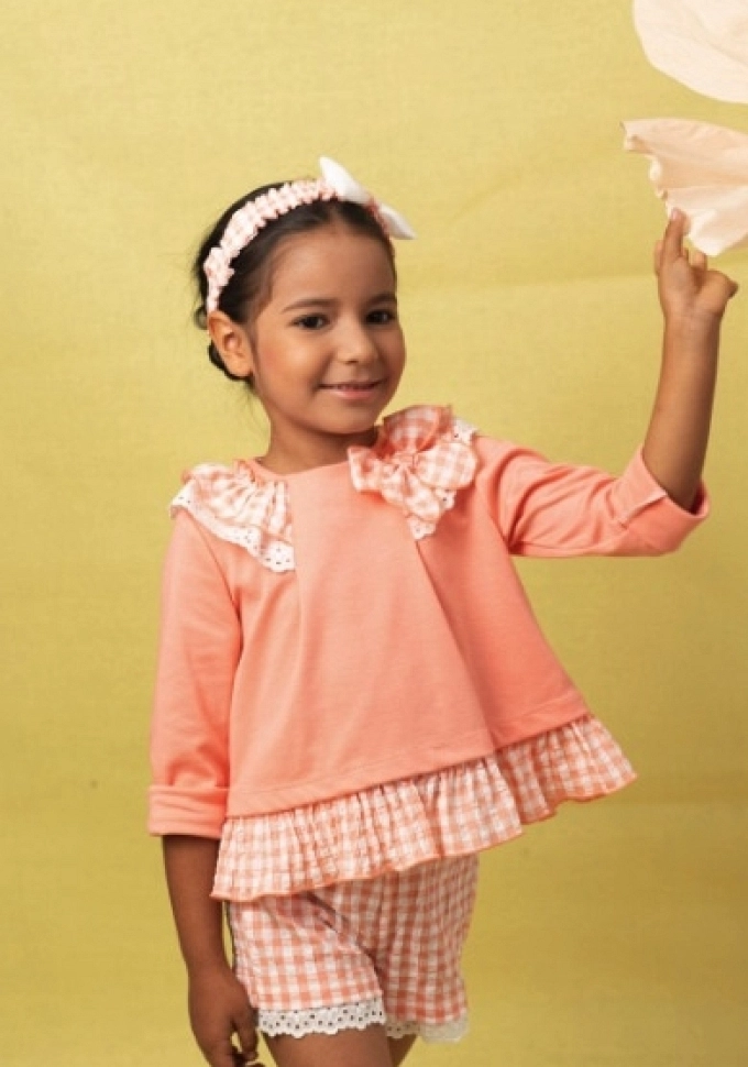 Sudadera de niña en color naranja.Basmarti.