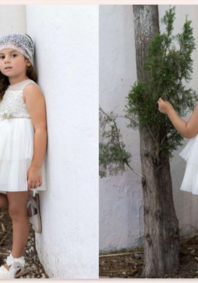 Vestido de ceremonia en color crudo.Basmarti.